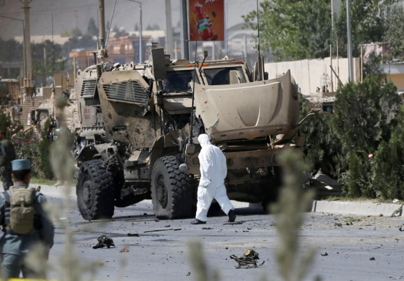 Car bomber hits NATO convoy in Afghanistan, civilians wounded