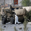 Car bomber hits NATO convoy in Afghanistan, civilians wounded