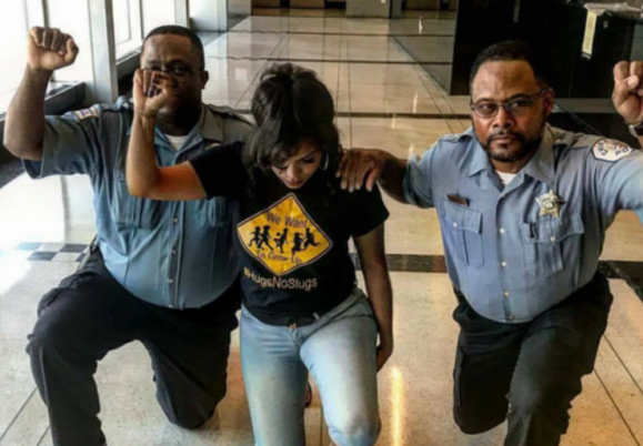MITCHELL: Black cops take a knee in solidarity with activist community